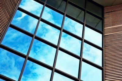Beautiful office building windows reflecting the sky