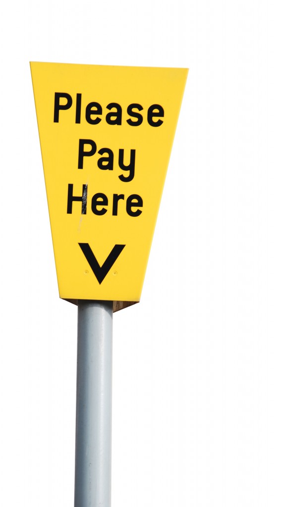 yellow please pay here sign